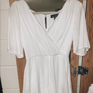 white, scalloped edge romper!